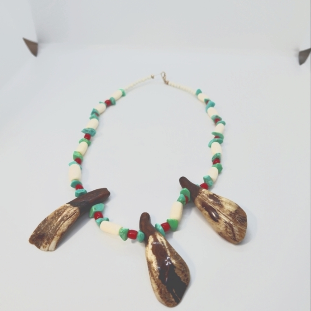 Necklace Turquoise Magnesite, Coral,   white bone beads and real buffalo teeth.